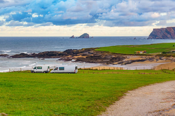 istock Campervans on sea coast in Asturias Spain. 1456776845