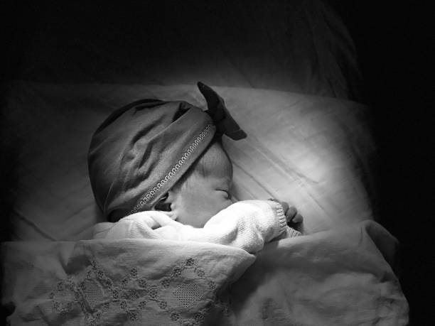 Just born baby girl resting after birth