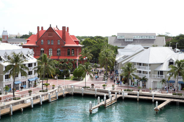 Key West is an American island city that is part of the Florida Keys archipelago. It is also the southernmost point of Florida, which extends 90 miles (144 km) north of Cuba. Famous for its pastel wooden houses, the city is a stopover for cruise ships and is also accessible from the mainland via the Overseas Highway. It is better known for its coral reefs (destinations for diving and snorkeling) than for its beaches.