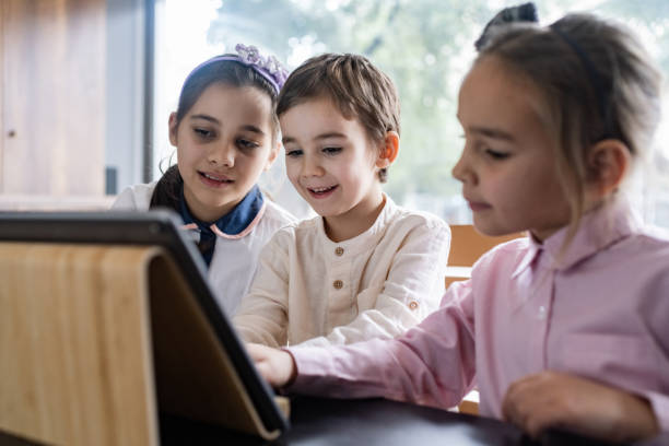 istock Children Playing Video Game Using Digital Tablet At Home 1456782027