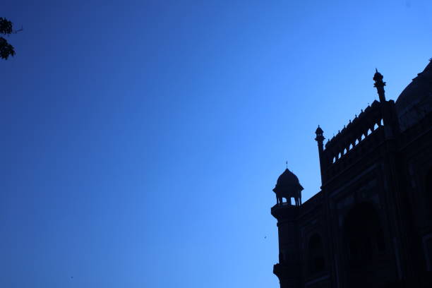 istock A stunning silhouette of the Red Fort during a deep red sunset. 1456782051