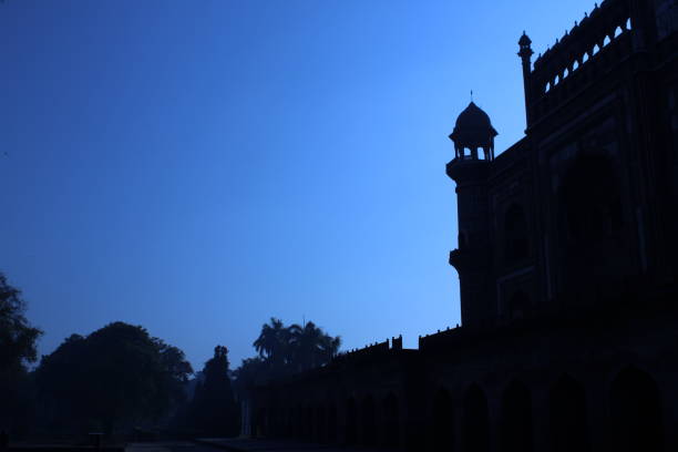istock A stunning silhouette of the Red Fort during a deep red sunset. 1456782114
