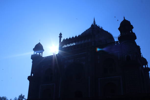 istock A stunning silhouette of the Red Fort during a deep red sunset. 1456782125