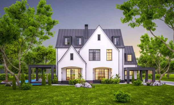 istock 3d rendering of white and black modern Tudor house in evening 1456784061