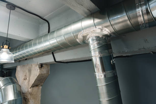 istock Silver ventilation pipes hanging from the ceiling inside the building 1456785317