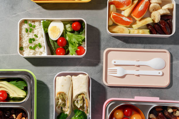 istock Containers with healthy food on gray background top view. 1456785512
