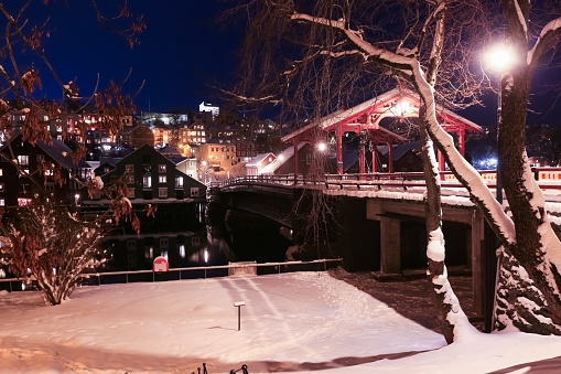 View of The Old Bridge ( den Gamle Bybro) in the snowy nightly Trondheim