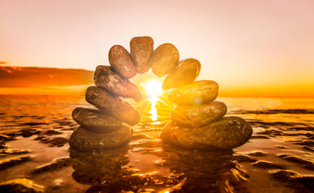 istock Stone arch in the water with horizon over water 1456795061