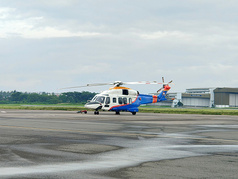 Close-up shot of helicopter parking on airport