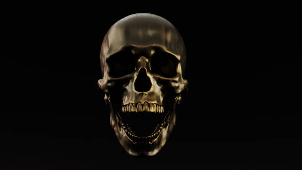 istock Screaming golden humen skull on dark background, 1456797523