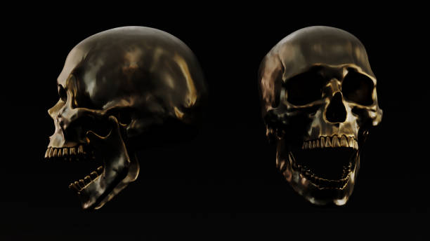 istock Screaming golden humen skull on dark background, 1456797526