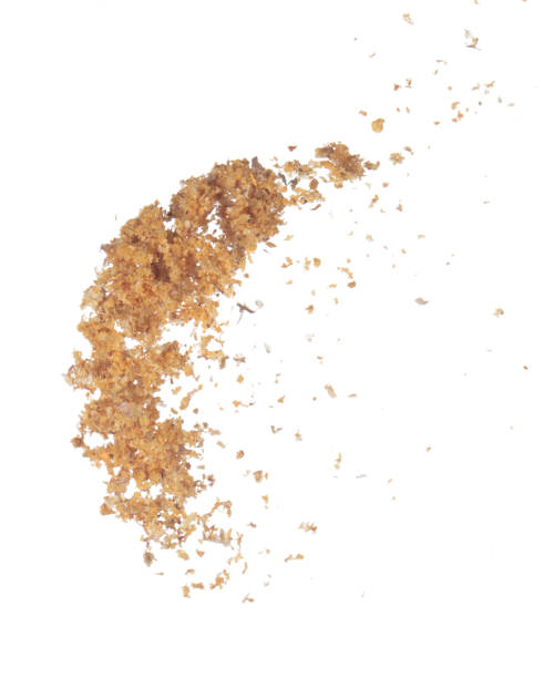 istock Fried Garlic pour fall down explosion, golden yellow fried garlic float abstract fly. Beautiful fried garlic splash stop in air, food object design. White background isolated high speed freeze 1456805030
