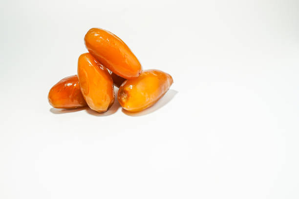 istock Fresh ripe yellow dates, fresh dates ruthob isolated on white background 1456809140
