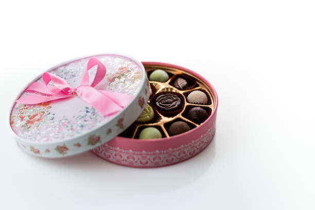 istock Chocolates in pink box with ribbon 1456809168