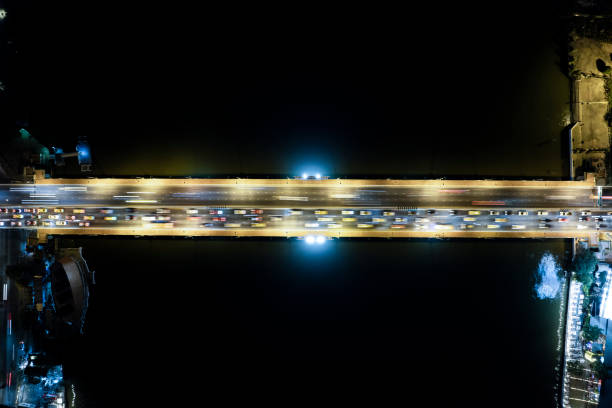 istock Expressway top view, Road traffic an important infrastructure, Drone aerial view fly in circle, traffic transportation, Public transport or commuter city life concept of economic and energ, transport. 1456811669