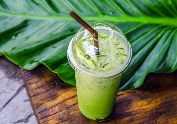 istock iced matcha latte, green tea with milk in a plastic glass with ice 1456813662