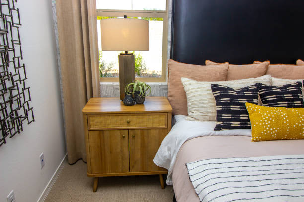 istock Master Bedroom Wooden Nightstand With Table Lamp 1456814113