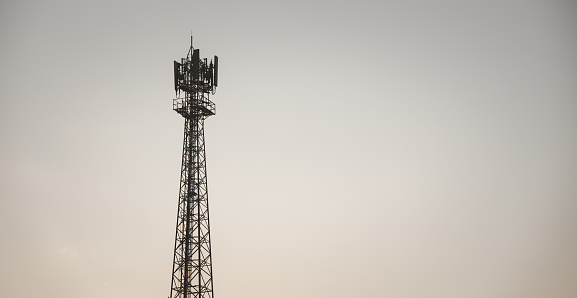 Silhouette of communication tower with night sky with space for text. communication concept. 5g.