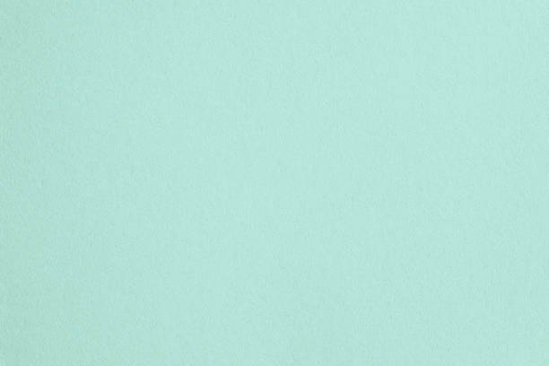 istock Macro closeup of kraft light green paper texture 1456814756