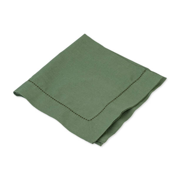 istock Folded green tissue napkin isolated over white background 1456816318