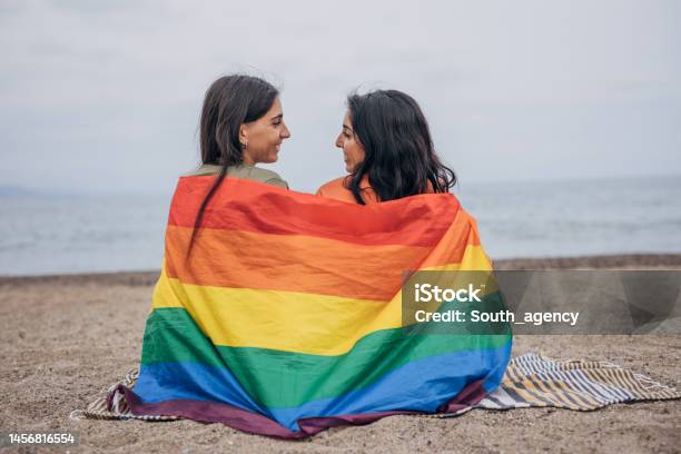 Lesbian Couple On The Beach Stock Photo - Download Image Now - LGBTQIA People, Pride, LGBTQIA Culture