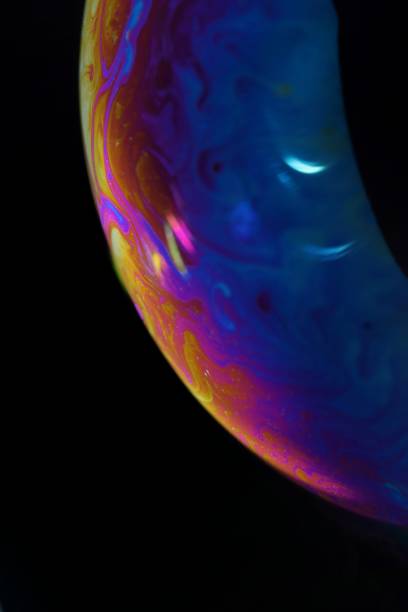 istock Soap bubble surface colorful macro photography. bubble surface resembles a planet. Selective focus close up photography. Wallpaper concept 1456816928
