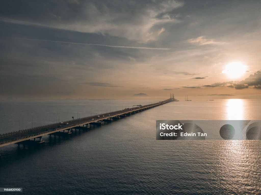 Morning Sunrise Penang bridge from aerial point of view Bridge - Built Structure Stock Photo