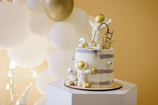 istock Spacemen decorated themed birthday cake. 1456820415