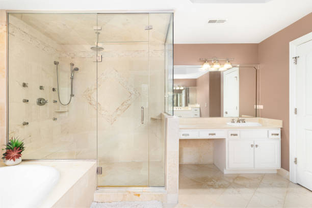 istock A large bathroom with a tiled walk-in shower. 1456821545