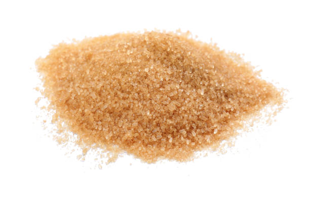 istock Pile of brown sugar on white background 1456821706