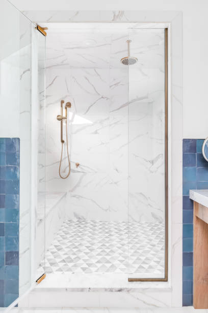 istock A bathroom with blue tiles and a beautifully tiled shower. 1456821849