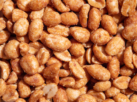 Beautiful tasty roasted honey peanuts texture for backgrounds