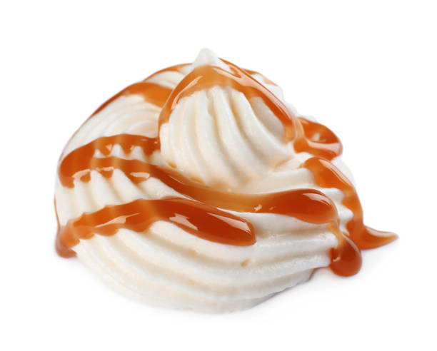 istock Delicious fresh whipped cream with caramel sauce isolated on white 1456823123