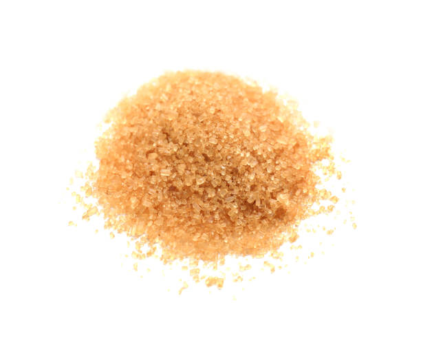 istock Pile of brown sugar on white background, top view 1456823208