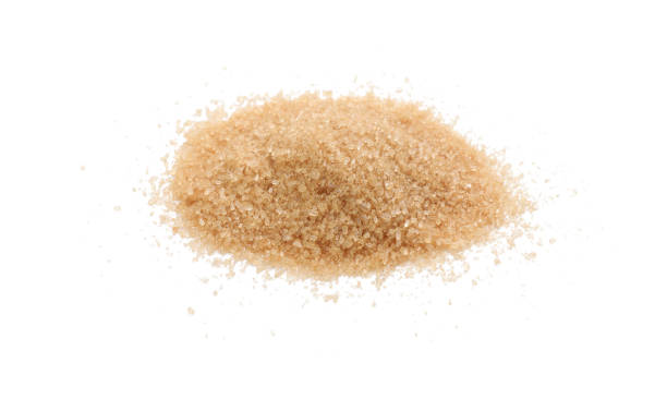 istock Pile of brown sugar on white background 1456823335