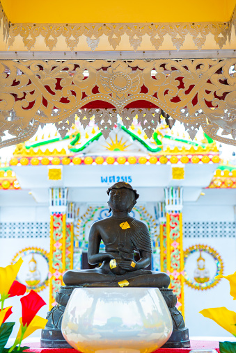 Upakut monk statue in Nantaram temple, Thailand.