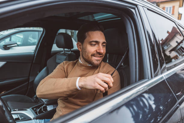 istock A man prepares to drive a car 1456826197