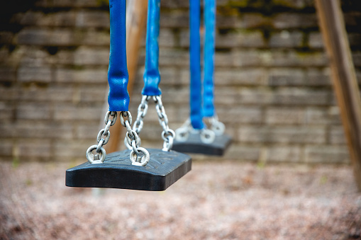 A Close up of empty swings
