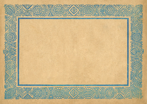 Primer plano de una vieja cubierta de cuaderno (aprox. 1900) con bonito marco de adornos azules. photo