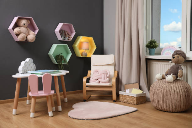istock Child's room interior with table and different toys 1456829458