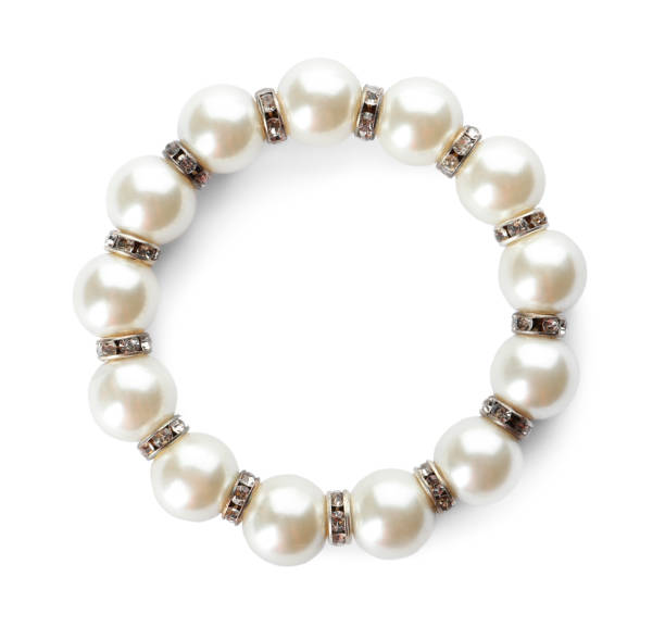 istock Elegant pearl bracelet isolated on white, top view 1456832036