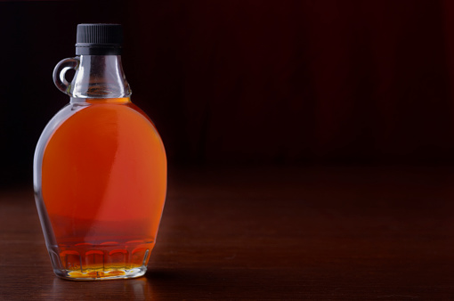 maple syrup on a dark background