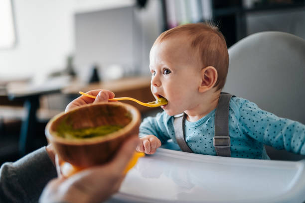 istock Cute little baby boy is hungry! 1456835177