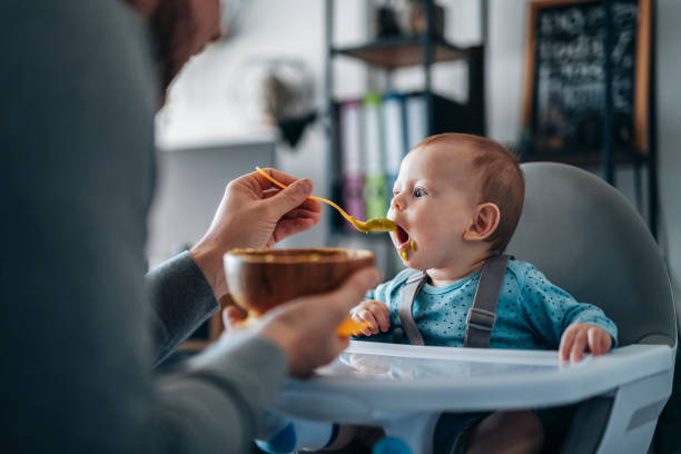 istock Cute little baby boy is hungry! 1456835197