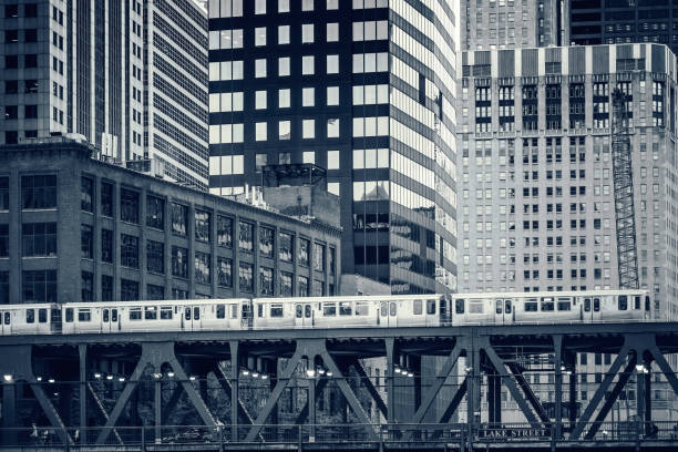 istock Black and white view of railway train in Chicago 1456843618