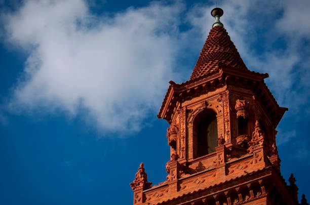 Church Steeple in St. Augustine, Florida. The Grace United Methodist Church in St. Augustine, Florida is an example of the Spanish Renaissance Revival style of architecture. revival stock pictures, royalty-free photos & images