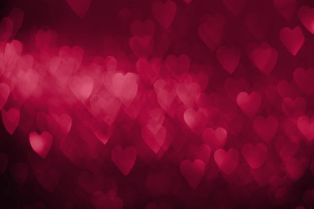 istock Magenta hearts bokeh abstract background 1456850794