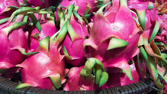 Pile of dragon fruit for sale at the market.