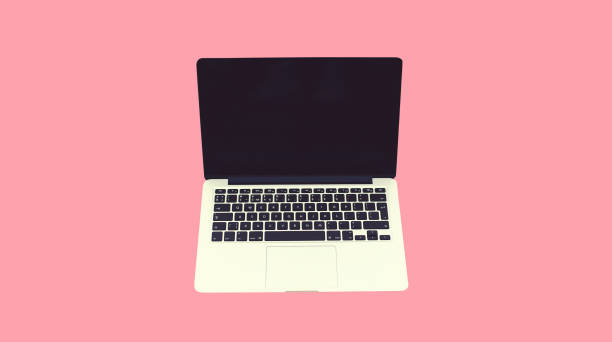 istock Close up laptop with blank black screen on pink background 1456853297