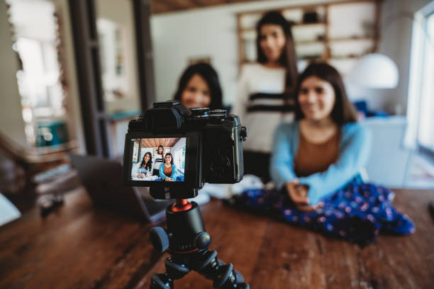 istock Three young adult women vlogging together 1456855187